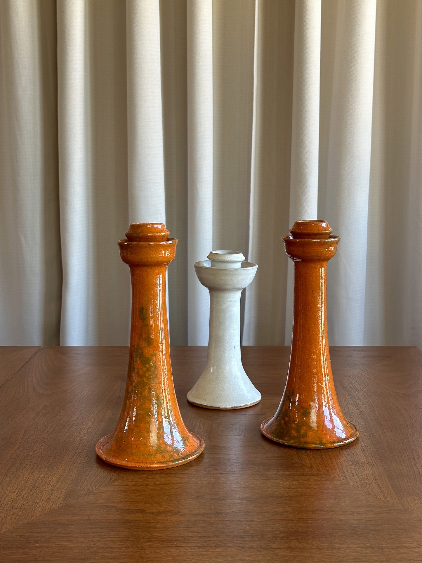 1923-'59, JUGTOWN rare Orange "Accidental" Lead-Glazed Candlesticks (pair)