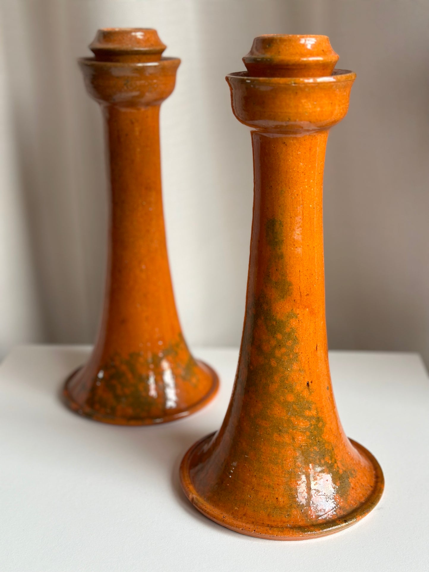 1923-'59, JUGTOWN rare Orange "Accidental" Lead-Glazed Candlesticks (pair)