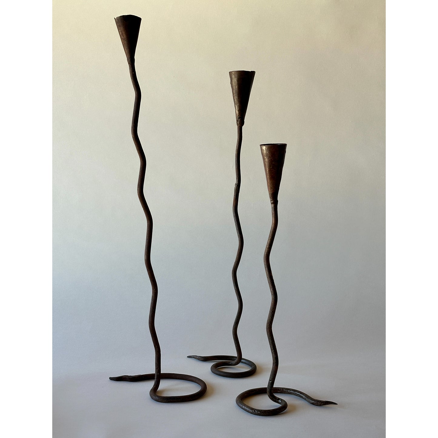 Trio of Vintage Hand-Forged Wrought Iron Candlesticks